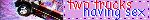 A pink blinkie with blue and red text and two trucks.